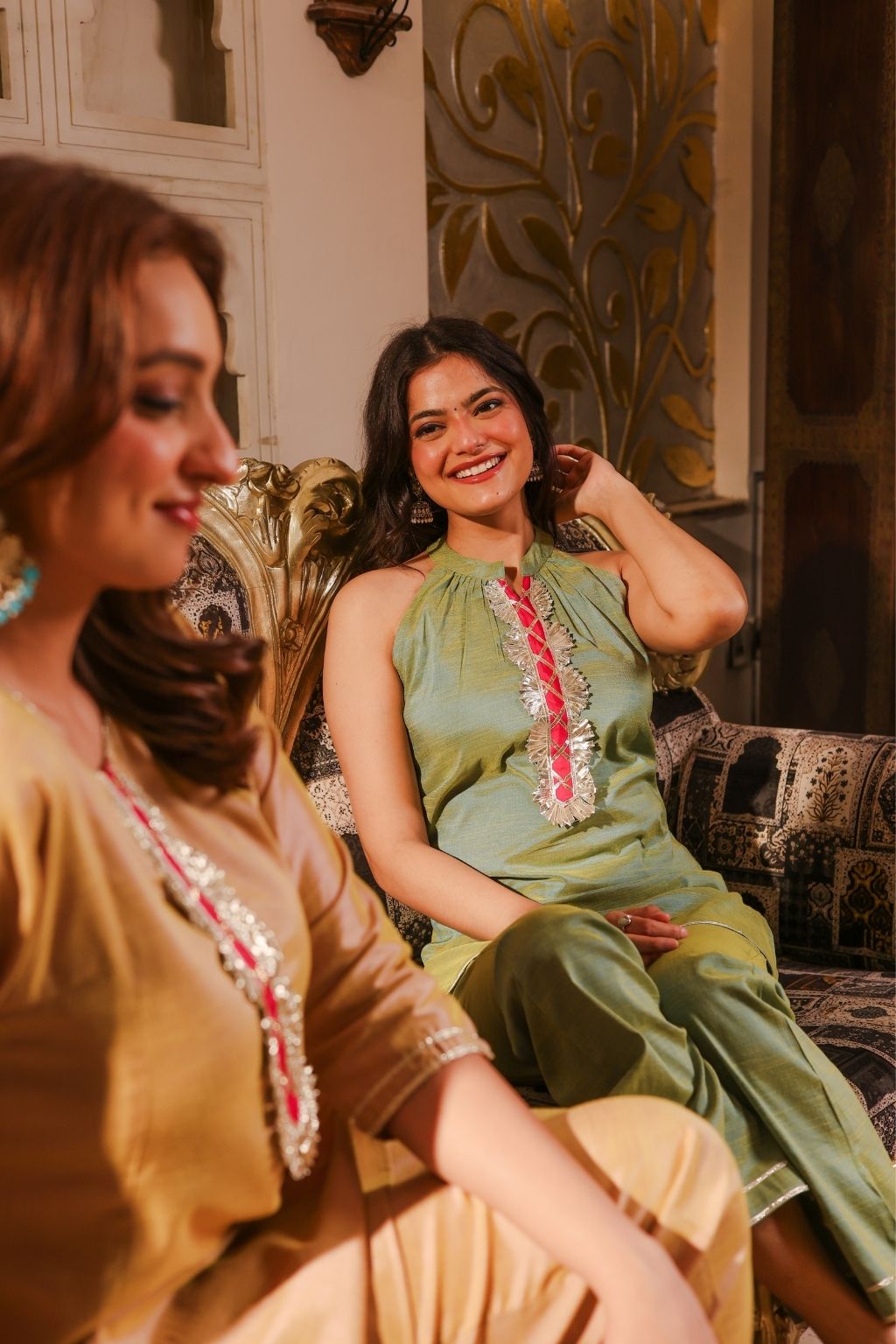 Green silk halter neck kurti with flared pants