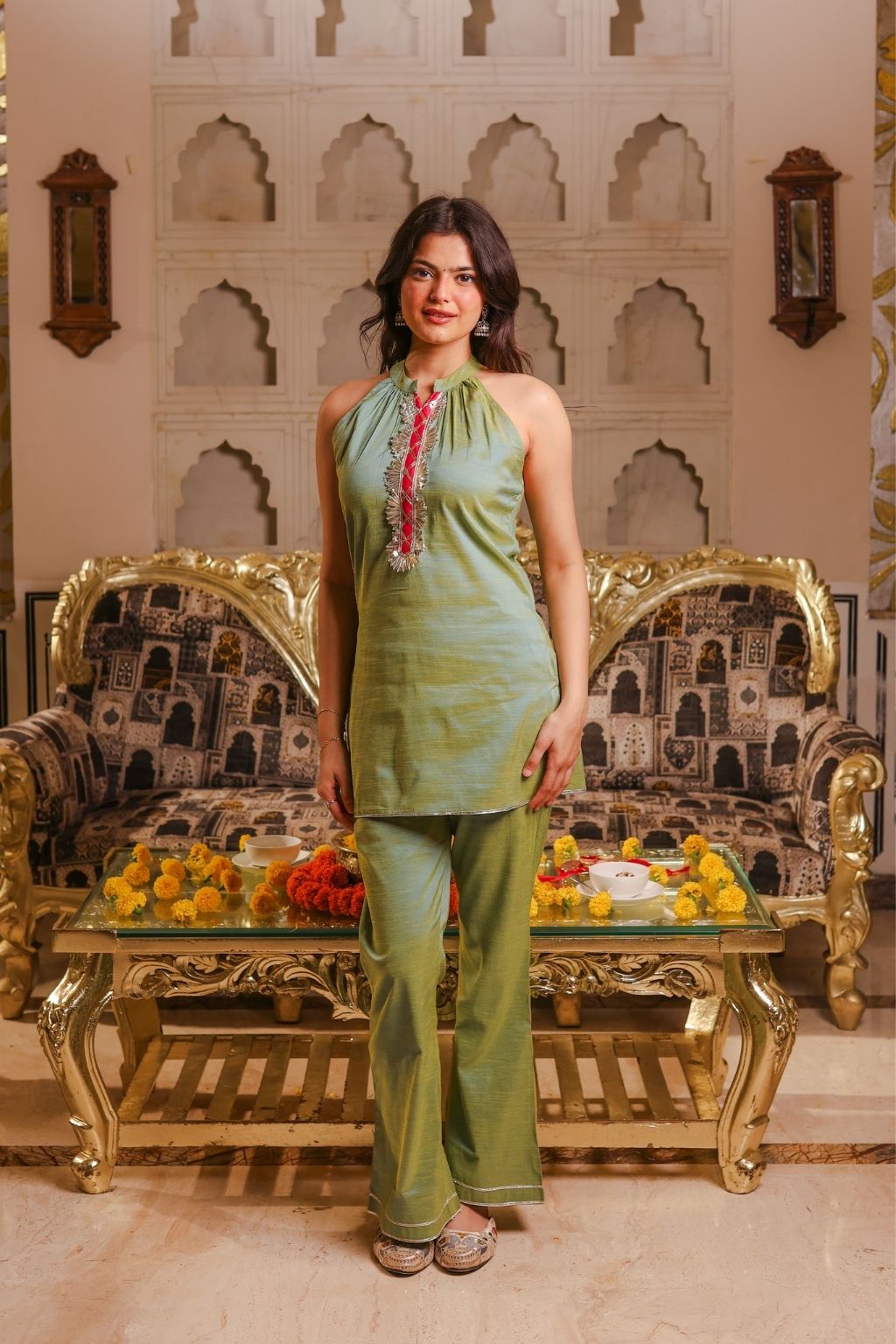 Green silk halter neck kurti with flared pants
